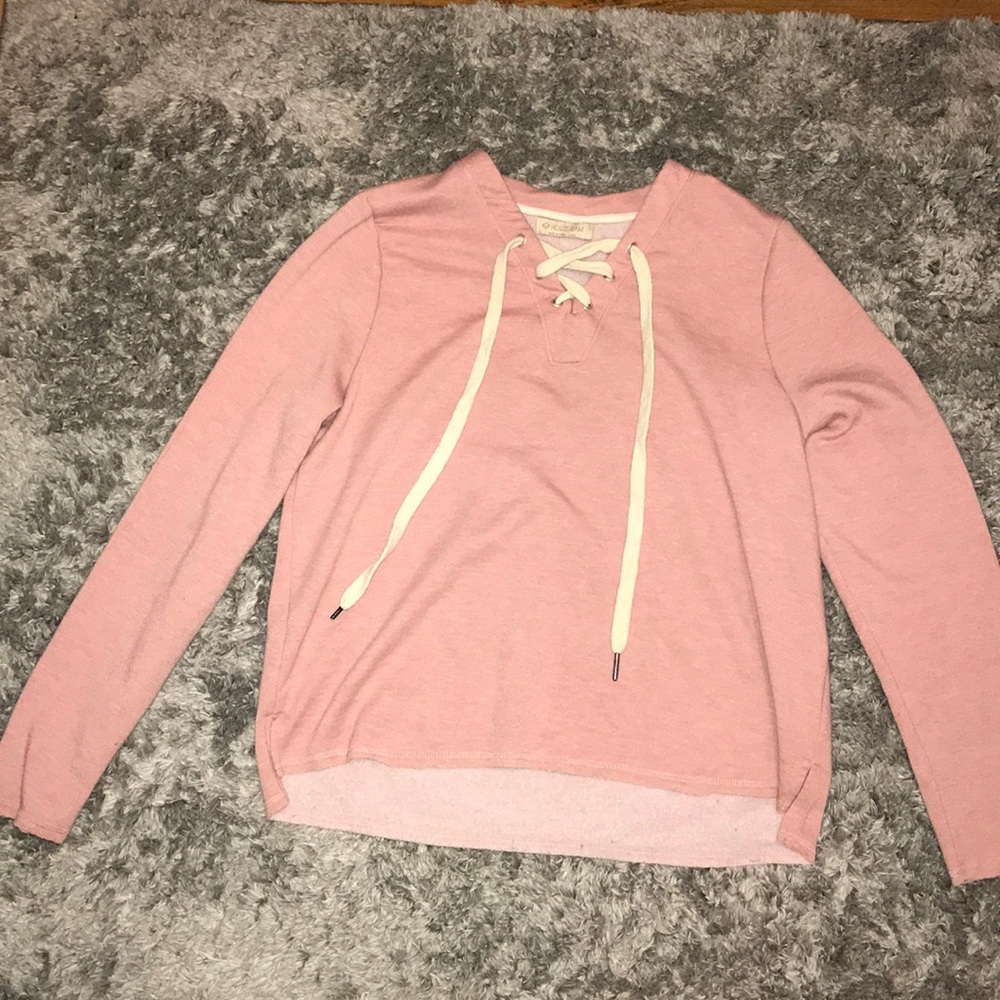 A pink long sleeve shirt